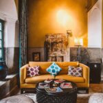 Vintage living room with restored wood cabinet and warm lighting